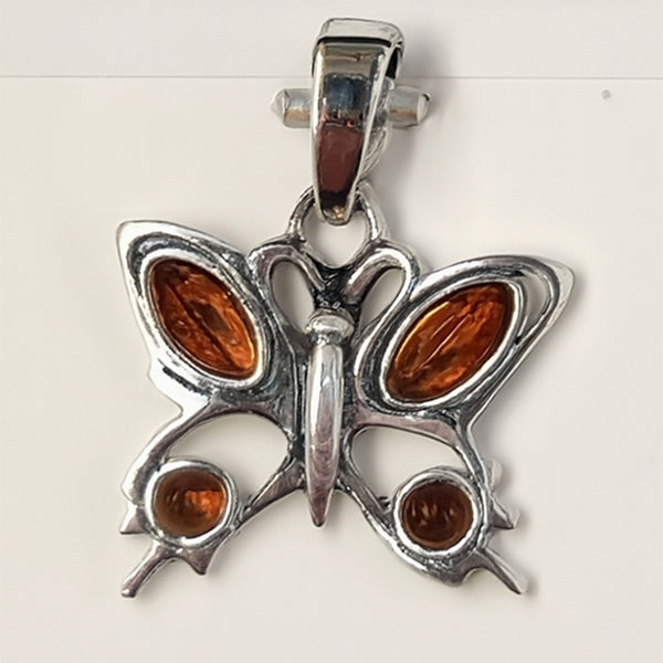 Pendant Baltic Amber butterfly sterling silver