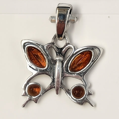 Pendant Baltic Amber butterfly sterling silver